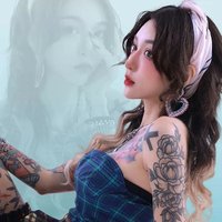 美女dj手臂上紋身圖片
